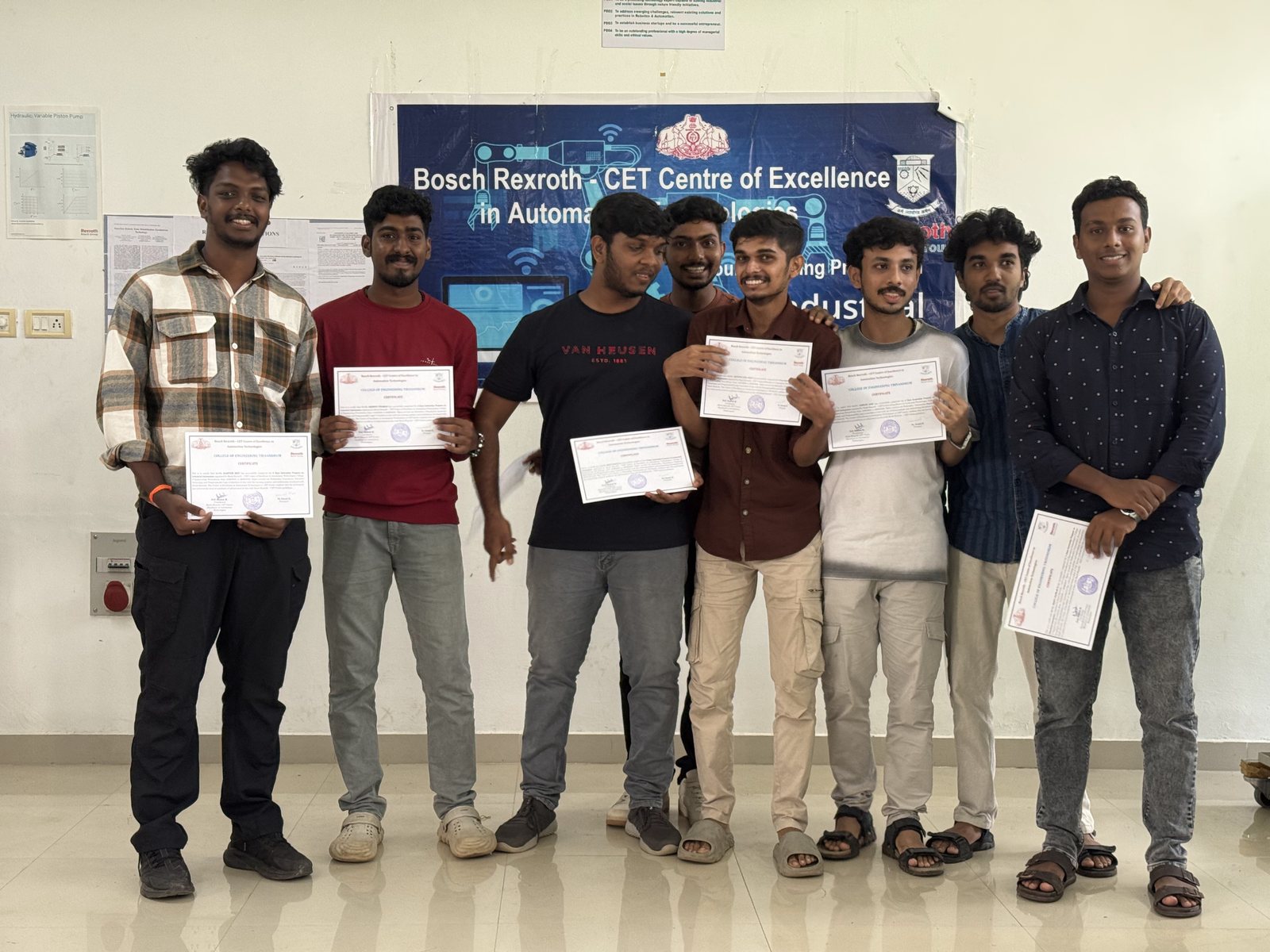 Interns holding their certificates at the Bosch Rexroth CET Centre of Excellence